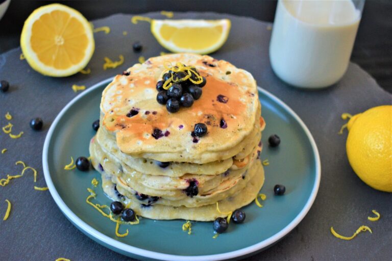 Vegan blueberry lemon pancakes served with agave syrup