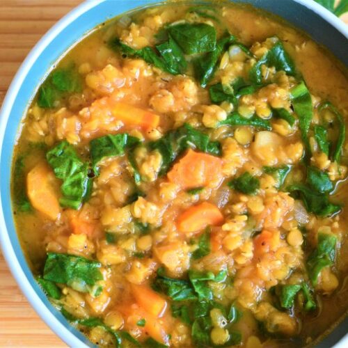 Vegan red lentil soup with carrots and spinach