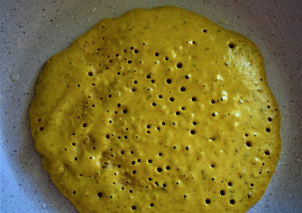 Vegan omelette in a frying pan