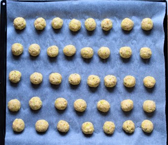Zucchini tofu balls in a baking trey