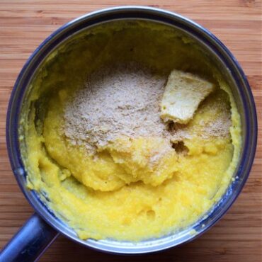Creamy polenta made with vegan butter and nutritional yeast