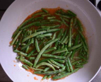 Green beans sauteed with garlic and tomato sauce