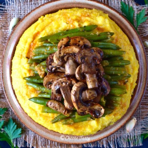 Garlicky green beans and soy sauce marinated mushrooms served with creamy polenta