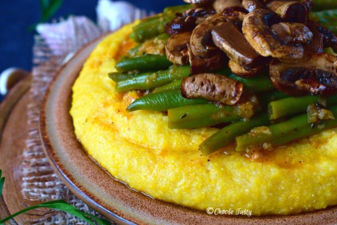 Green beans and marinated mushrooms served with polenta