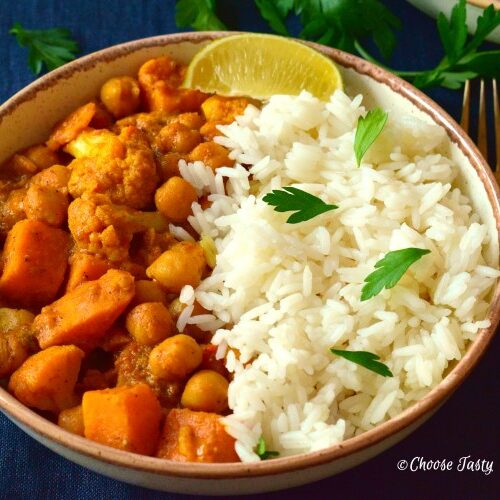 Sweet potato, cauliflower and chickpea curry served with rice