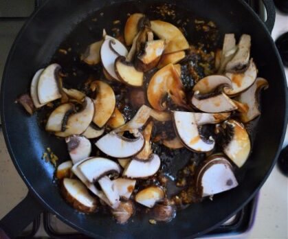 Mushrooms are pan fried with ginger, garlic and sauce