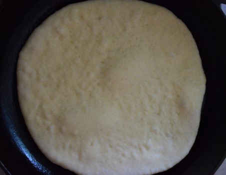 Cook Greek pita in a frying pan