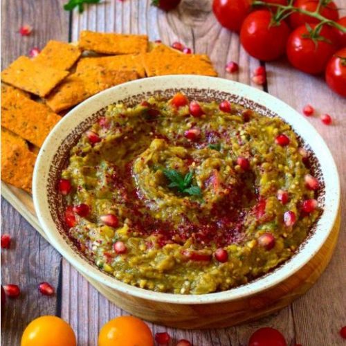 Baba ganoush bowl served with crackers