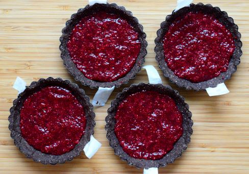 Tarts crust filled with raspberry chia jam